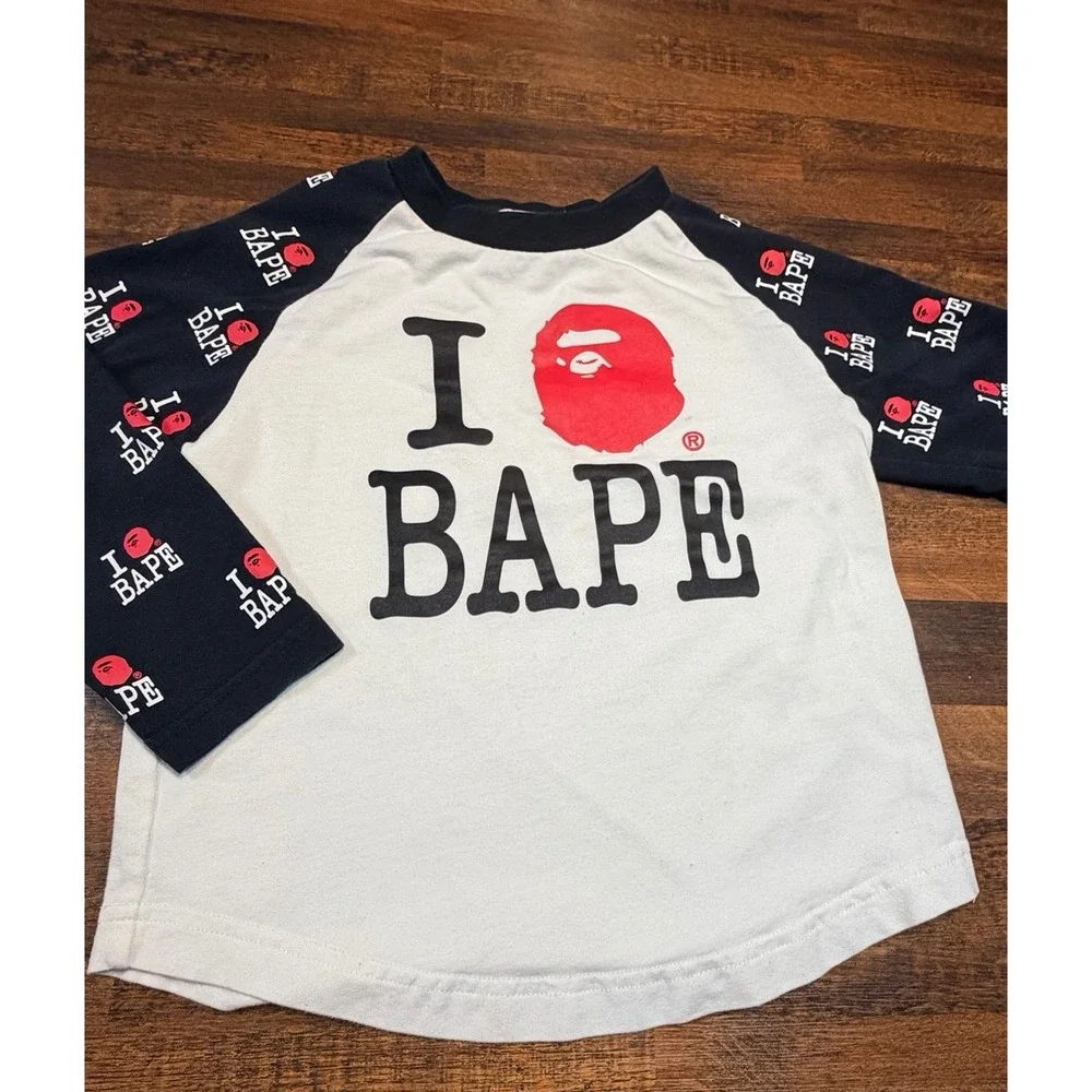 Bathing Ape BAPE kids raglan l/s shirt size 110. 2/3T. Patterned logo sleeves